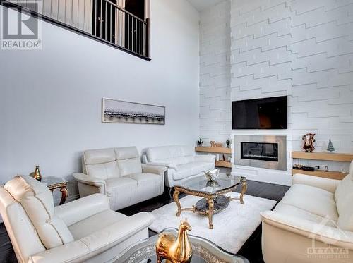 1680 Linkland Court, Ottawa, ON - Indoor Photo Showing Living Room With Fireplace