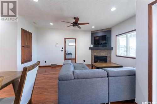 206 Muzyka Road, Saskatoon, SK - Indoor Photo Showing Living Room With Fireplace