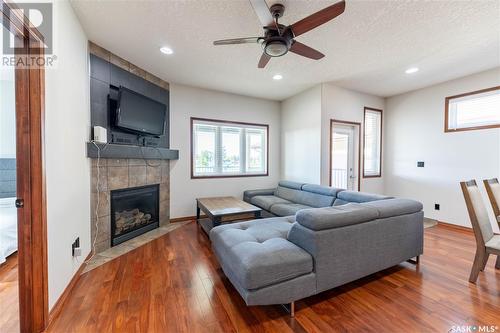 206 Muzyka Road, Saskatoon, SK - Indoor Photo Showing Living Room With Fireplace