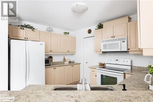 24 Dairy Lane Unit# 206, Huntsville, ON - Indoor Photo Showing Kitchen With Double Sink