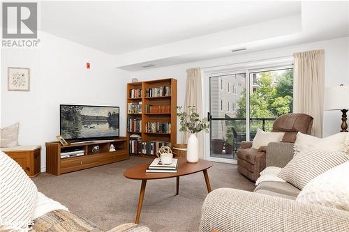 24 Dairy Lane Unit# 206, Huntsville, ON - Indoor Photo Showing Living Room