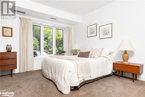 24 Dairy Lane Unit# 206, Huntsville, ON - Indoor Photo Showing Bedroom