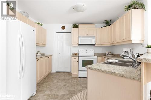 24 Dairy Lane Unit# 206, Huntsville, ON - Indoor Photo Showing Kitchen With Double Sink