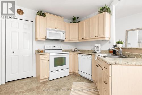 206 - 24 Dairy Lane, Huntsville (Chaffey), ON - Indoor Photo Showing Kitchen With Double Sink