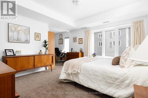 206 - 24 Dairy Lane, Huntsville (Chaffey), ON - Indoor Photo Showing Bedroom