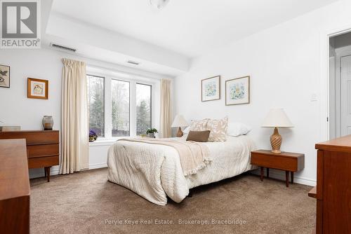 206 - 24 Dairy Lane, Huntsville (Chaffey), ON - Indoor Photo Showing Bedroom