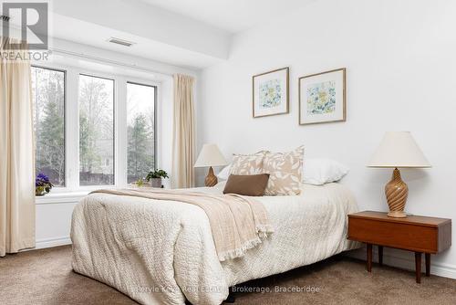 206 - 24 Dairy Lane, Huntsville (Chaffey), ON - Indoor Photo Showing Bedroom