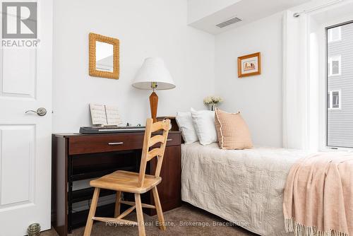 206 - 24 Dairy Lane, Huntsville (Chaffey), ON - Indoor Photo Showing Bedroom