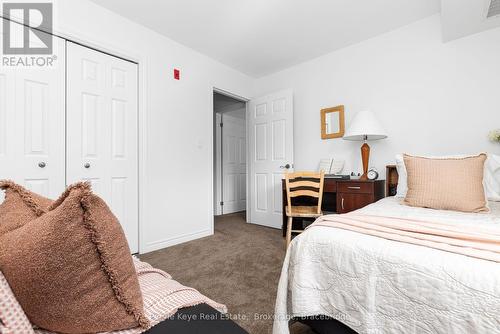 206 - 24 Dairy Lane, Huntsville (Chaffey), ON - Indoor Photo Showing Bedroom