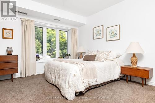 206 - 24 Dairy Lane, Huntsville (Chaffey), ON - Indoor Photo Showing Bedroom