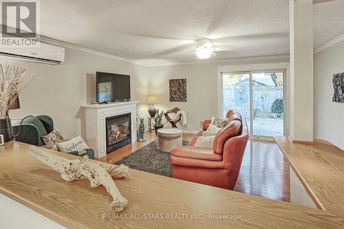 76 Fairmeadow Drive, Guelph, ON - Indoor Photo Showing Living Room With Fireplace