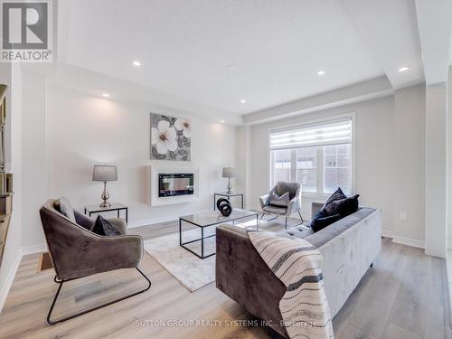 64 Hager Creek Terrace, Hamilton, ON - Indoor Photo Showing Living Room With Fireplace