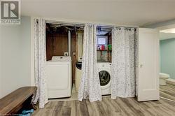 Laundry is tucked away behind curtains - 