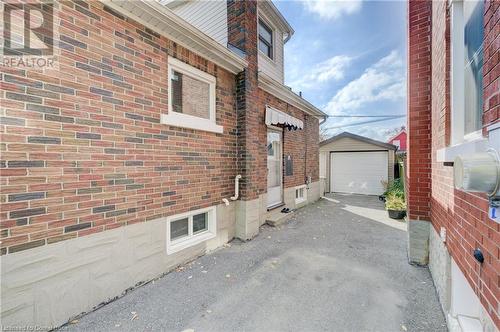 Long driveway fits 3 cars - 53 Hett Avenue, Kitchener, ON - Outdoor With Exterior