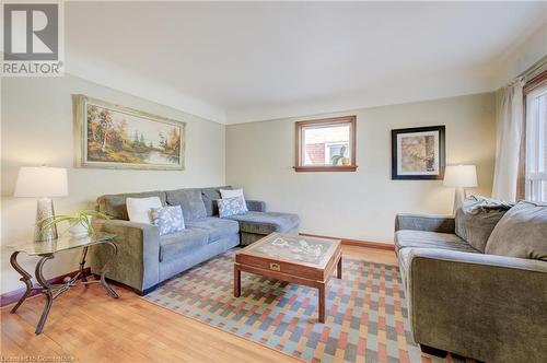 Original hardwood floors throughout - 53 Hett Avenue, Kitchener, ON - Indoor Photo Showing Living Room