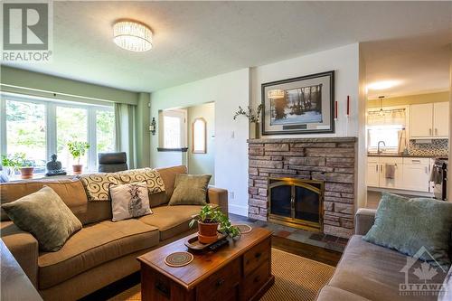 1860 Featherston Drive, Ottawa, ON - Indoor Photo Showing Living Room With Fireplace