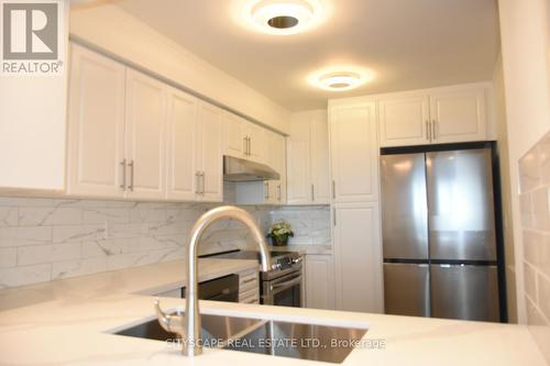 1201 - 3845 Lakeshore Boulevard, Toronto, ON - Indoor Photo Showing Kitchen With Double Sink With Upgraded Kitchen