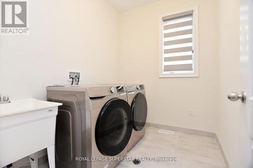 102 Rugman Crescent, Springwater, ON - Indoor Photo Showing Laundry Room