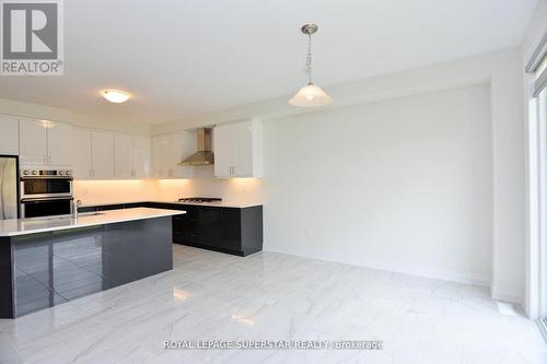 102 Rugman Crescent, Springwater, ON - Indoor Photo Showing Kitchen