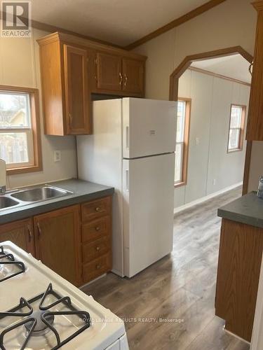 4 - 33 Pitt Street, Bayham (Port Burwell), ON - Indoor Photo Showing Kitchen With Double Sink