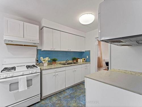 16-20 Hainford St, Toronto, ON - Indoor Photo Showing Kitchen With Double Sink