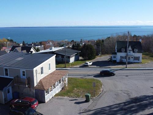 Aerial photo - 434 Rue St-Laurent, Saint-Siméon, QC - Outdoor With Body Of Water