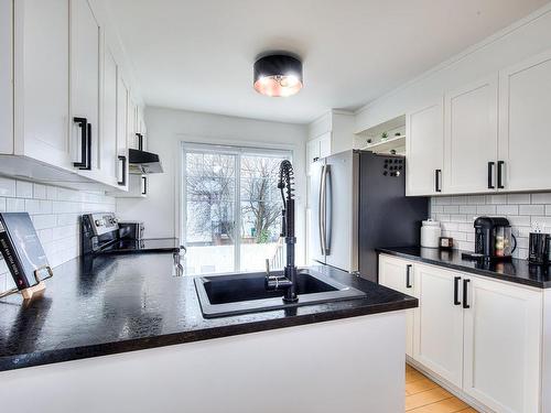 Kitchen - 151 Rue Cherie, Lavaltrie, QC - Indoor Photo Showing Kitchen