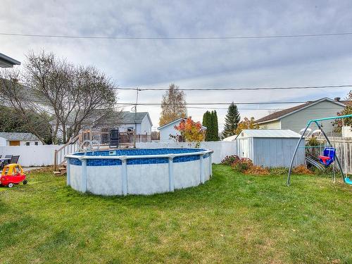 Backyard - 151 Rue Cherie, Lavaltrie, QC - Outdoor With Above Ground Pool With Backyard