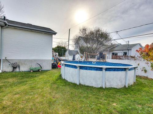 Backyard - 151 Rue Cherie, Lavaltrie, QC - Outdoor With Above Ground Pool