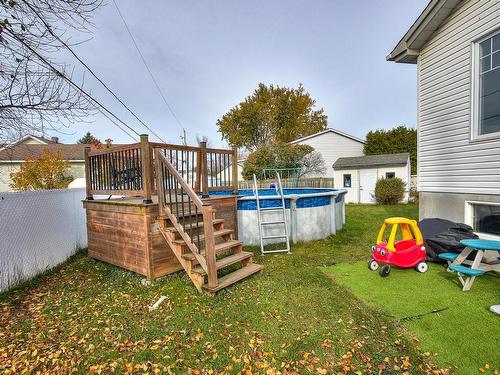 Backyard - 151 Rue Cherie, Lavaltrie, QC - Outdoor With Above Ground Pool With Exterior