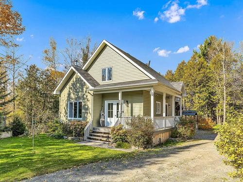 Frontage - 25 Ch. Des Trilles Blancs, L'Ange-Gardien, QC - Outdoor With Deck Patio Veranda With Facade