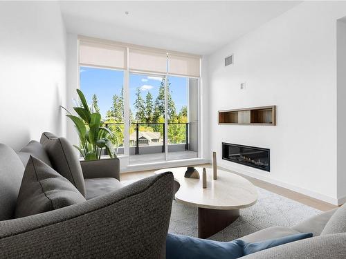 502-2000 Hannington Rd, Langford, BC - Indoor Photo Showing Living Room With Fireplace