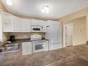 104-1150 Walkem Rd, Ladysmith, BC  - Indoor Photo Showing Kitchen With Double Sink 