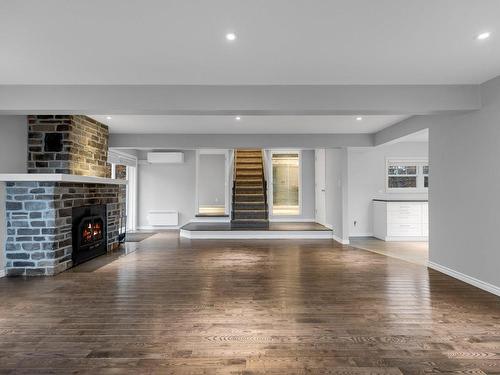 Salle familiale - 1589 Ch. Kelly, Saint-Sauveur, QC - Indoor Photo Showing Living Room With Fireplace