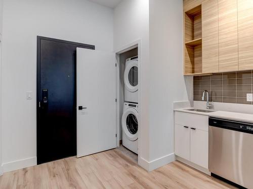 Laundry room - 1906-1180 Rue De Bleury, Montréal (Ville-Marie), QC - Indoor Photo Showing Laundry Room