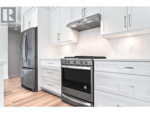 128 River Gate  Drive, Kamloops, BC - Indoor Photo Showing Kitchen With Upgraded Kitchen