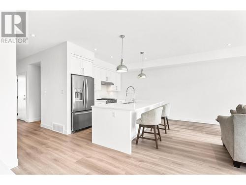 128 River Gate  Drive, Kamloops, BC - Indoor Photo Showing Kitchen With Upgraded Kitchen