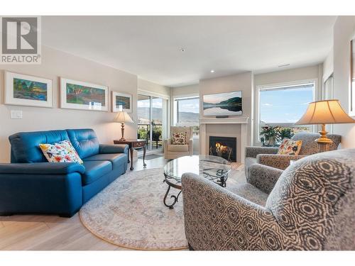 3346 Skaha Lake Road Unit# 802, Penticton, BC - Indoor Photo Showing Living Room With Fireplace