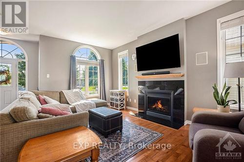 6912 Mary Anne Drive, Ottawa, ON - Indoor Photo Showing Living Room With Fireplace