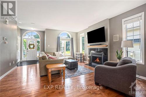 6912 Mary Anne Drive, Ottawa, ON - Indoor Photo Showing Living Room With Fireplace