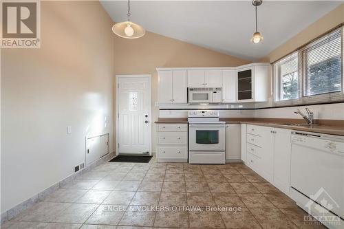 Photo is virtually staged. There's hardwood flooring underneath the carpet. The rendering is to give ideas on how it could be set up to allow for a dining area and living room area combination. - 1349 Bloomsbury Crescent, Ottawa, ON - Indoor Photo Showing Living Room