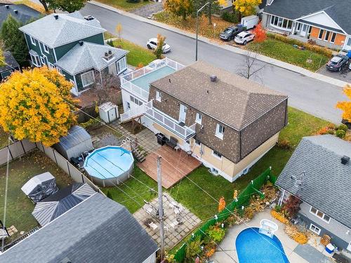 Overall view - 5590  - 5600 Av. De Gaulle, Québec (Charlesbourg), QC - Outdoor With Above Ground Pool With Deck Patio Veranda