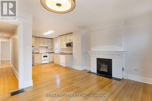 96 Roncesvalles Avenue, Toronto, ON - Indoor With Fireplace