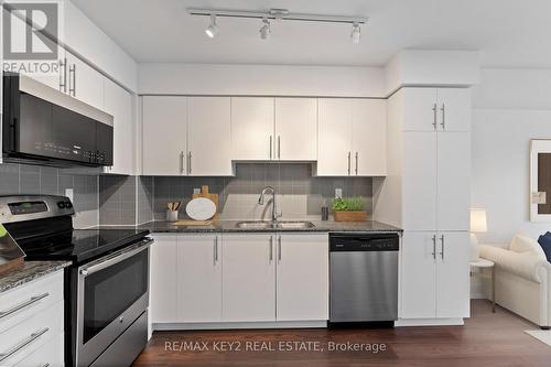 205 - 1215 Bayly Street, Pickering, ON - Indoor Photo Showing Kitchen With Double Sink