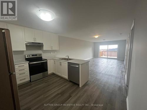 1449B Benson Street, Innisfil, ON - Indoor Photo Showing Kitchen With Stainless Steel Kitchen With Double Sink