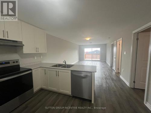 1449B Benson Street, Innisfil, ON - Indoor Photo Showing Kitchen With Double Sink