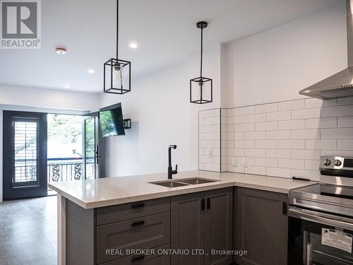 1 - 284 James Street N, Hamilton, ON - Indoor Photo Showing Kitchen With Double Sink