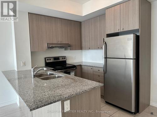 717 - 8323 Kennedy Road, Markham, ON - Indoor Photo Showing Kitchen With Double Sink With Upgraded Kitchen