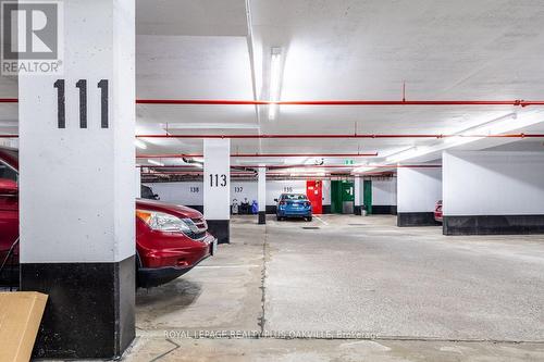 517 - 2511 Lakeshore Road W, Oakville, ON - Indoor Photo Showing Garage