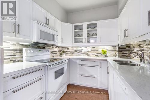 517 - 2511 Lakeshore Road W, Oakville, ON - Indoor Photo Showing Kitchen With Double Sink